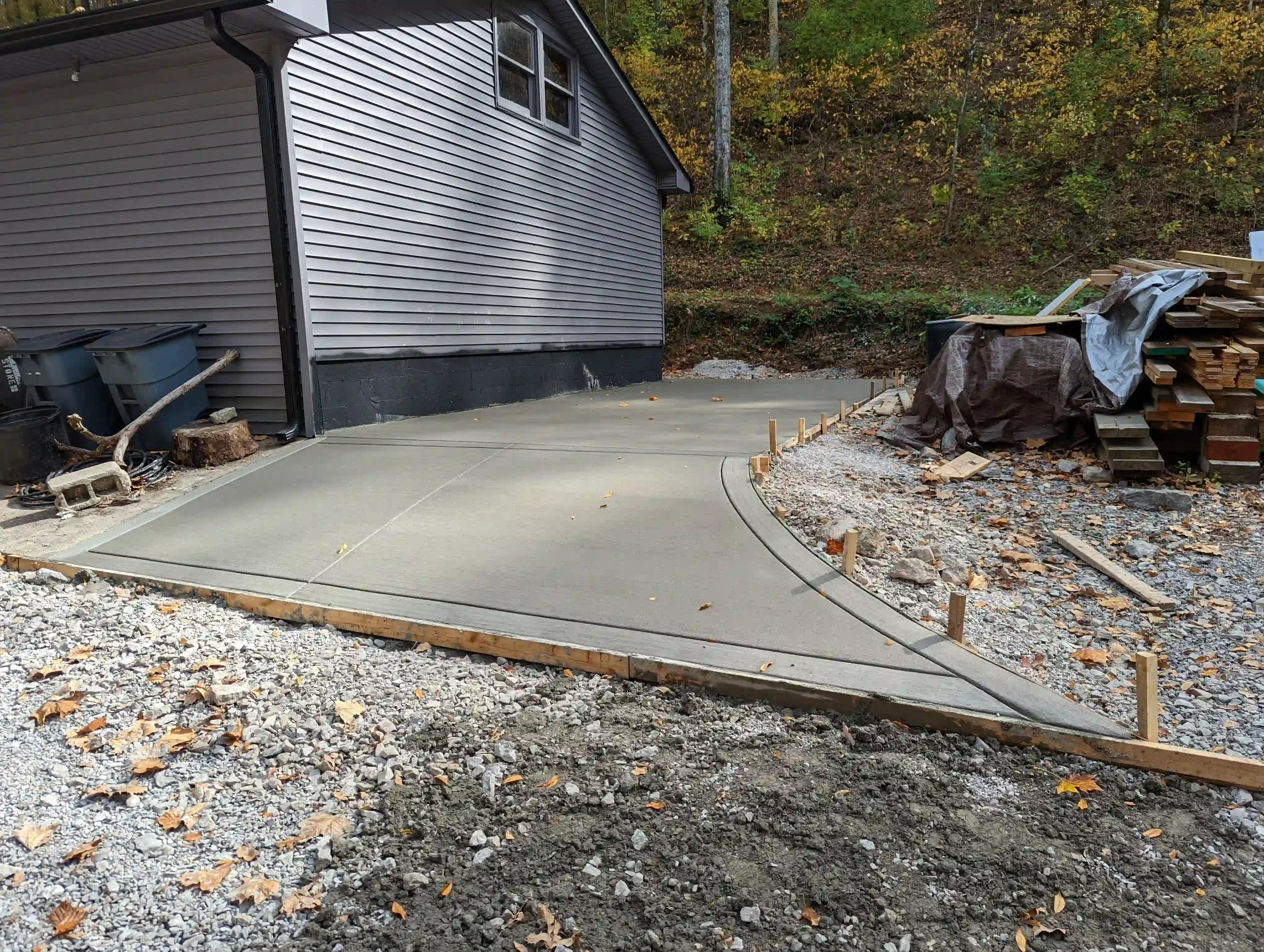 concrete poured driveway with the mold still in place