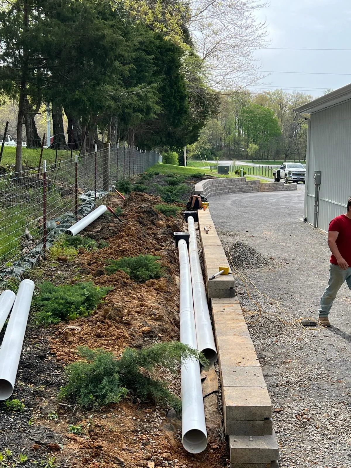 Underground drainage pipe installation in progress