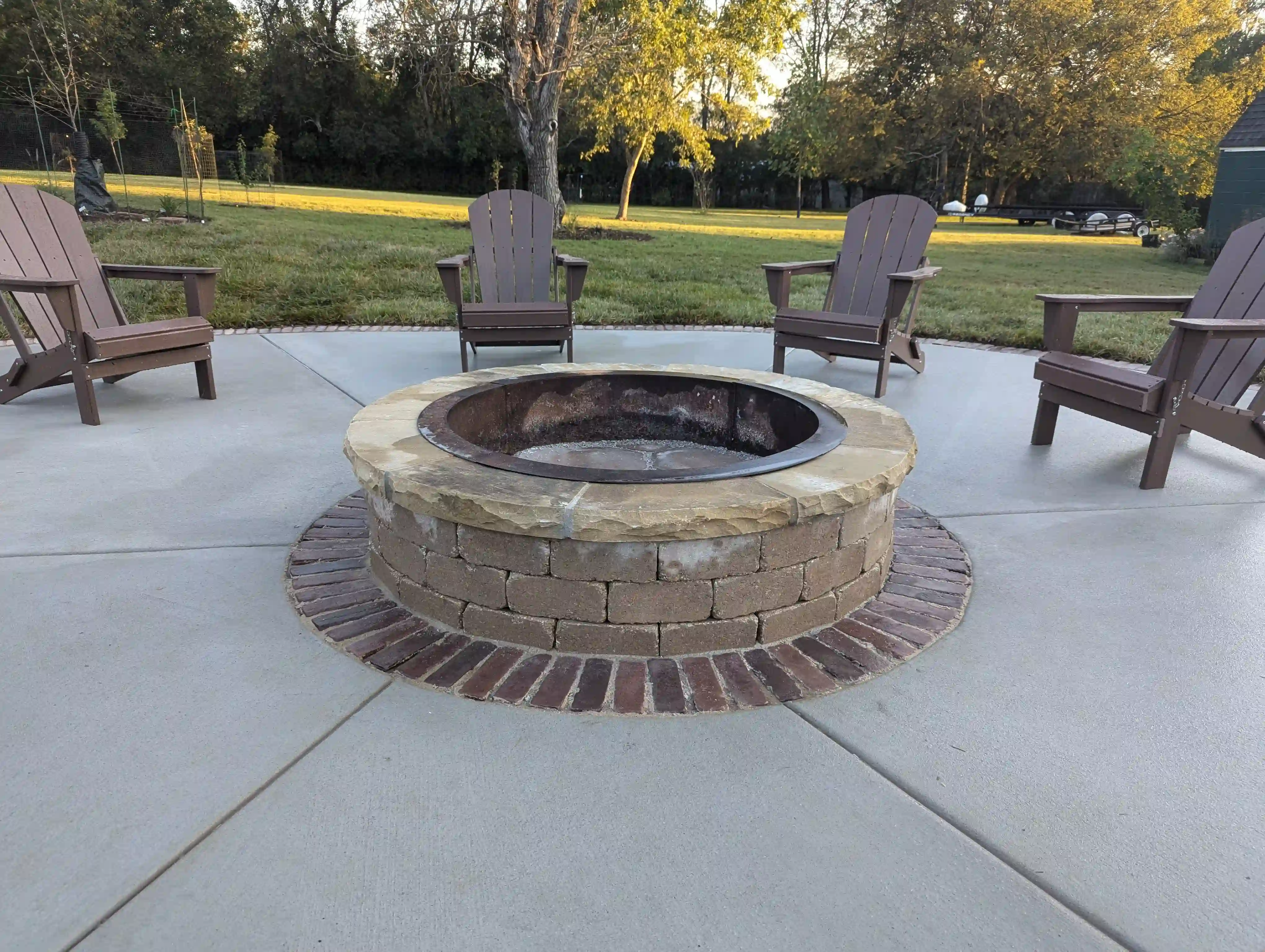 Cozy backyard fire pit at night