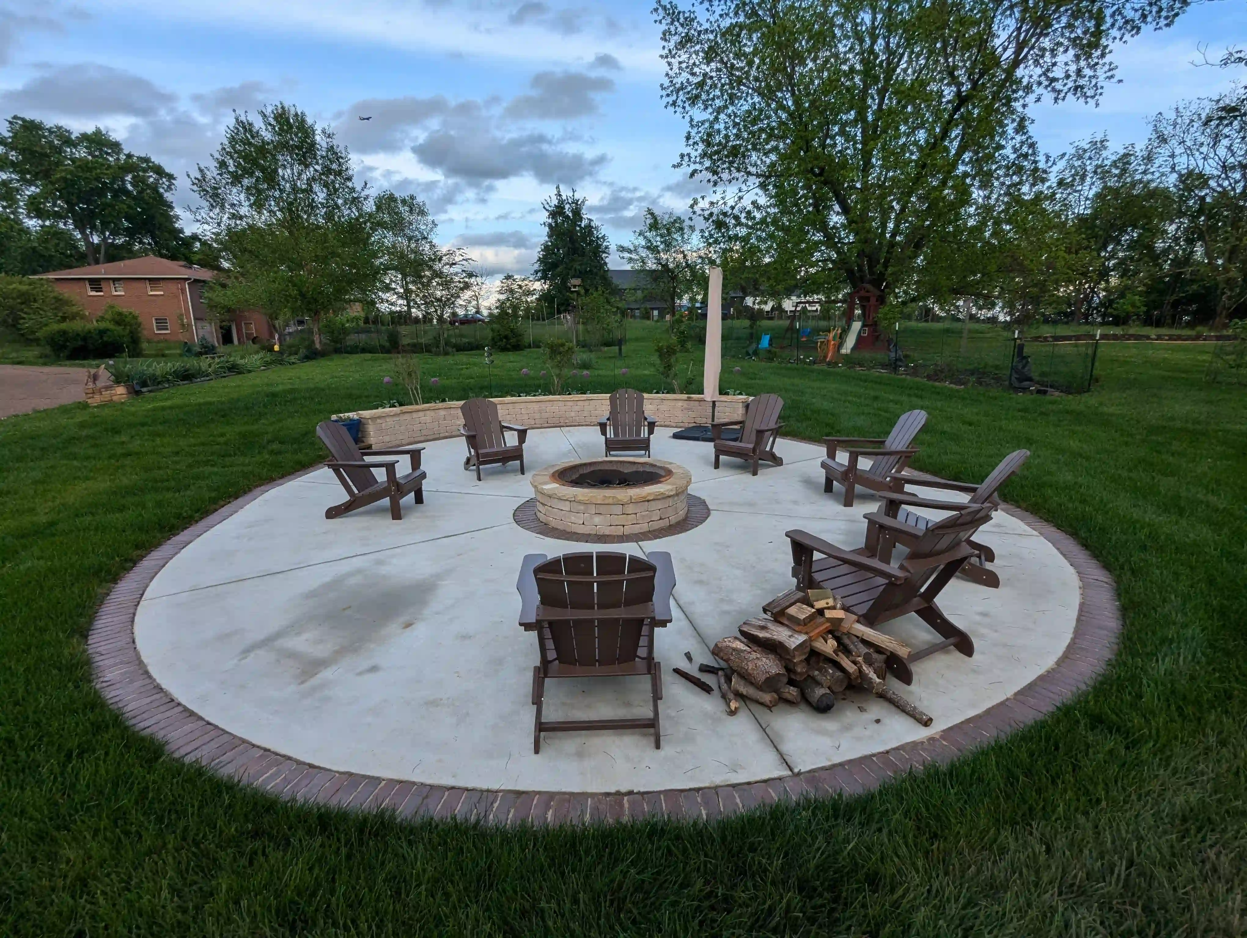 Small outdoor fire bowl with flickering flames