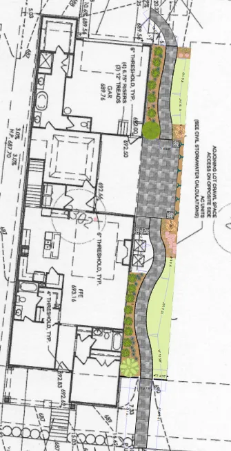 pencil on a piece of paper showing a house
