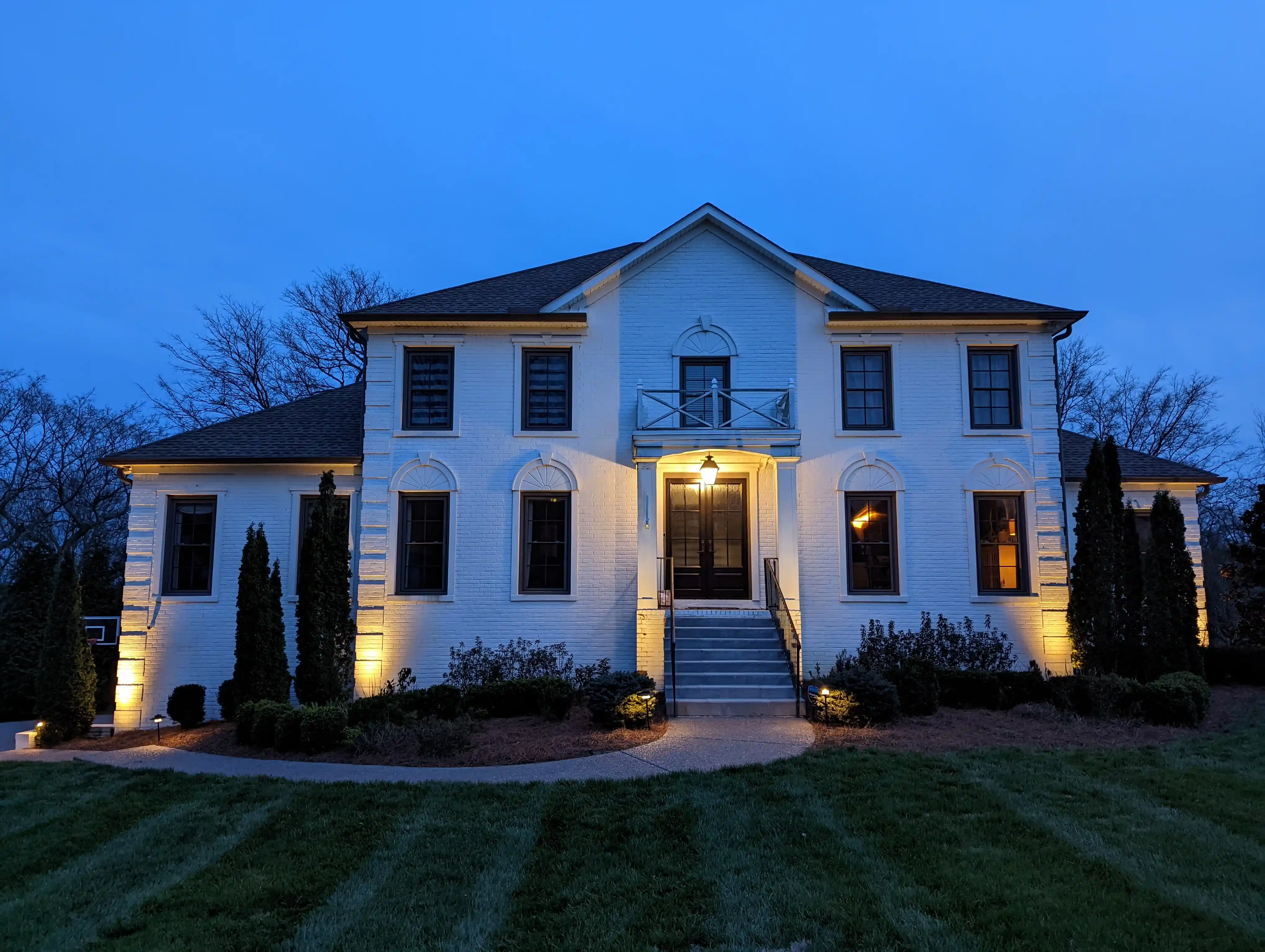 Custom step lighting integrated into a high-end patio design
