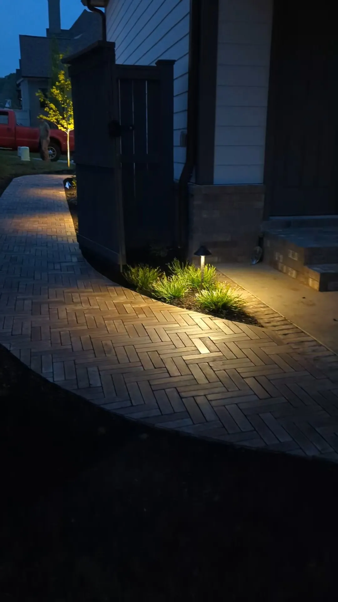 Moonlight-effect lighting on a luxury property's landscape features