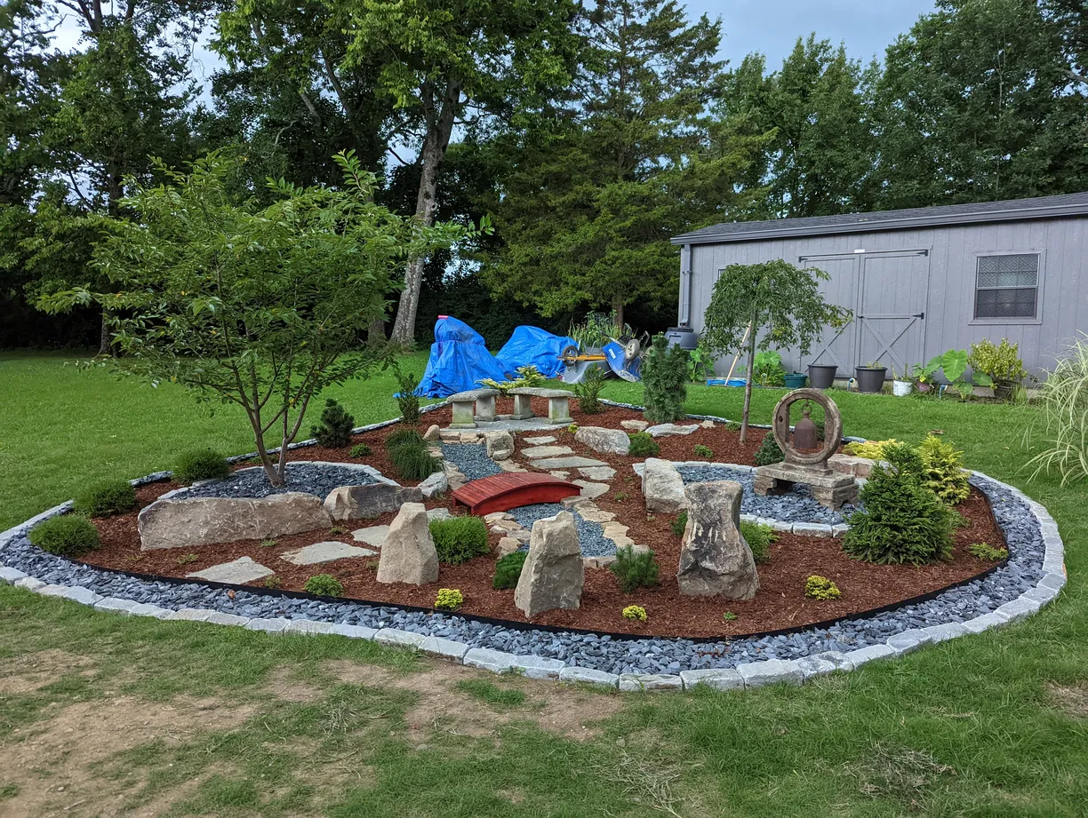 Garden installation with decorative mulch and healthy vegetation