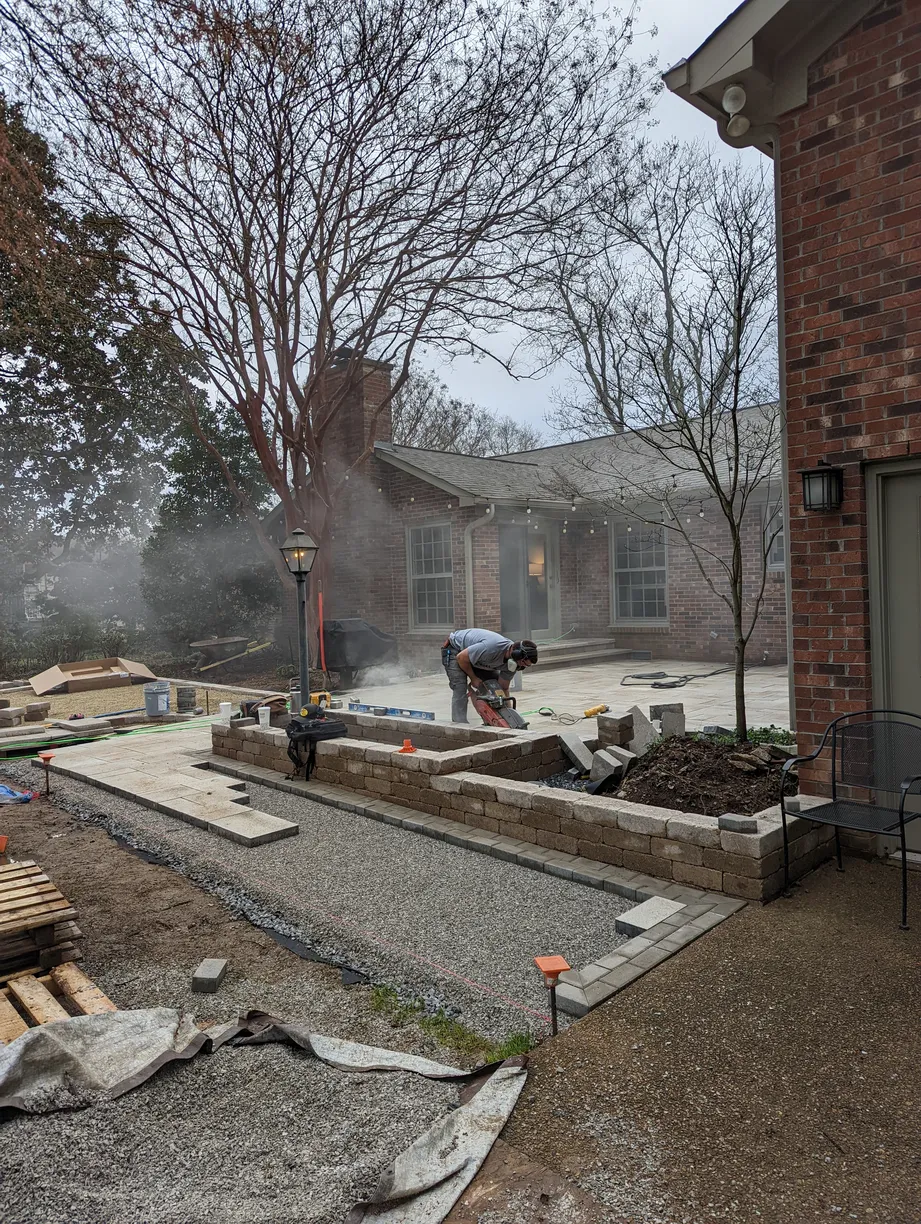 professional curring stone to lay into an incomplete paver walkway