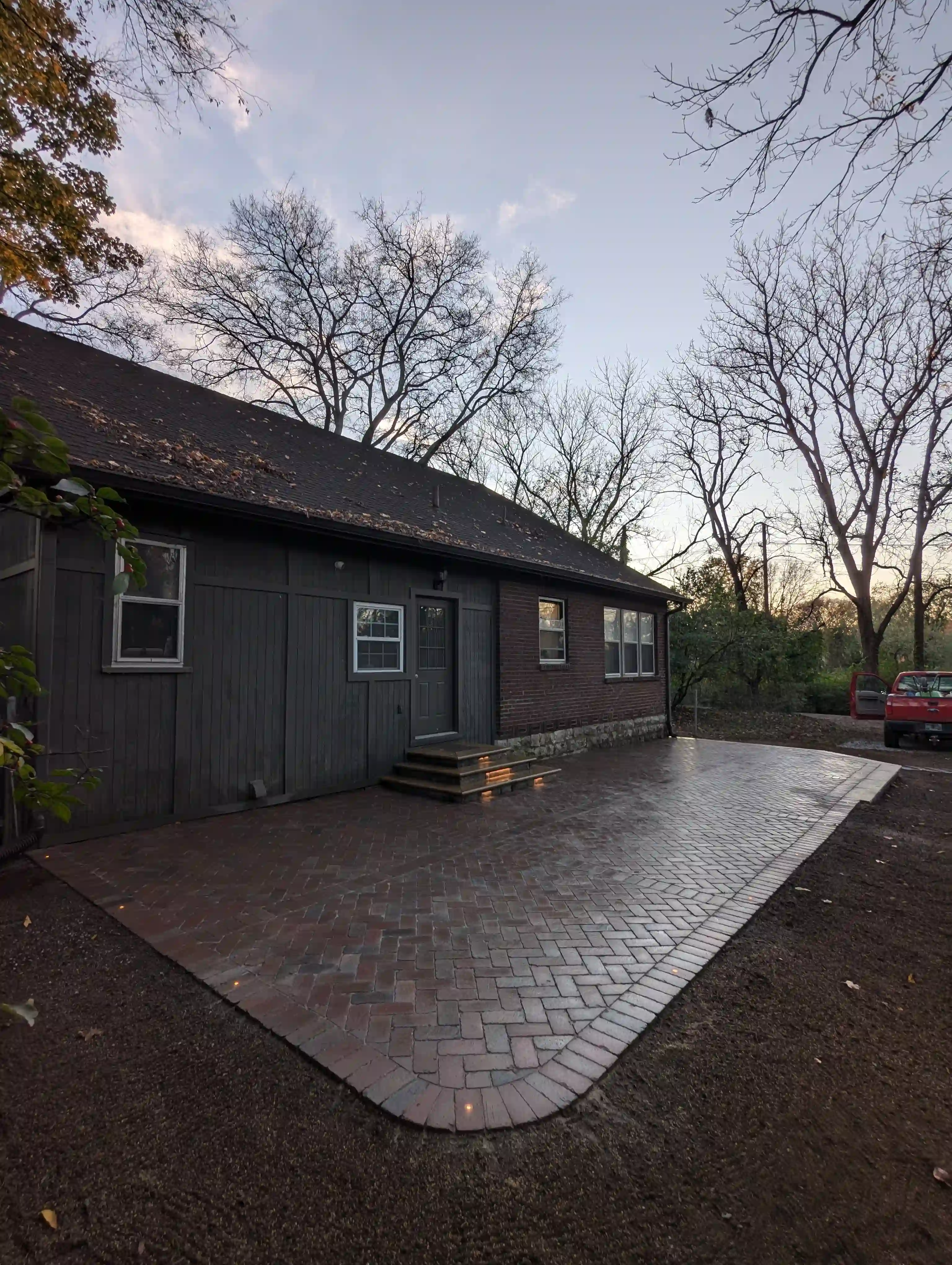 solid patio in the front of a work shed