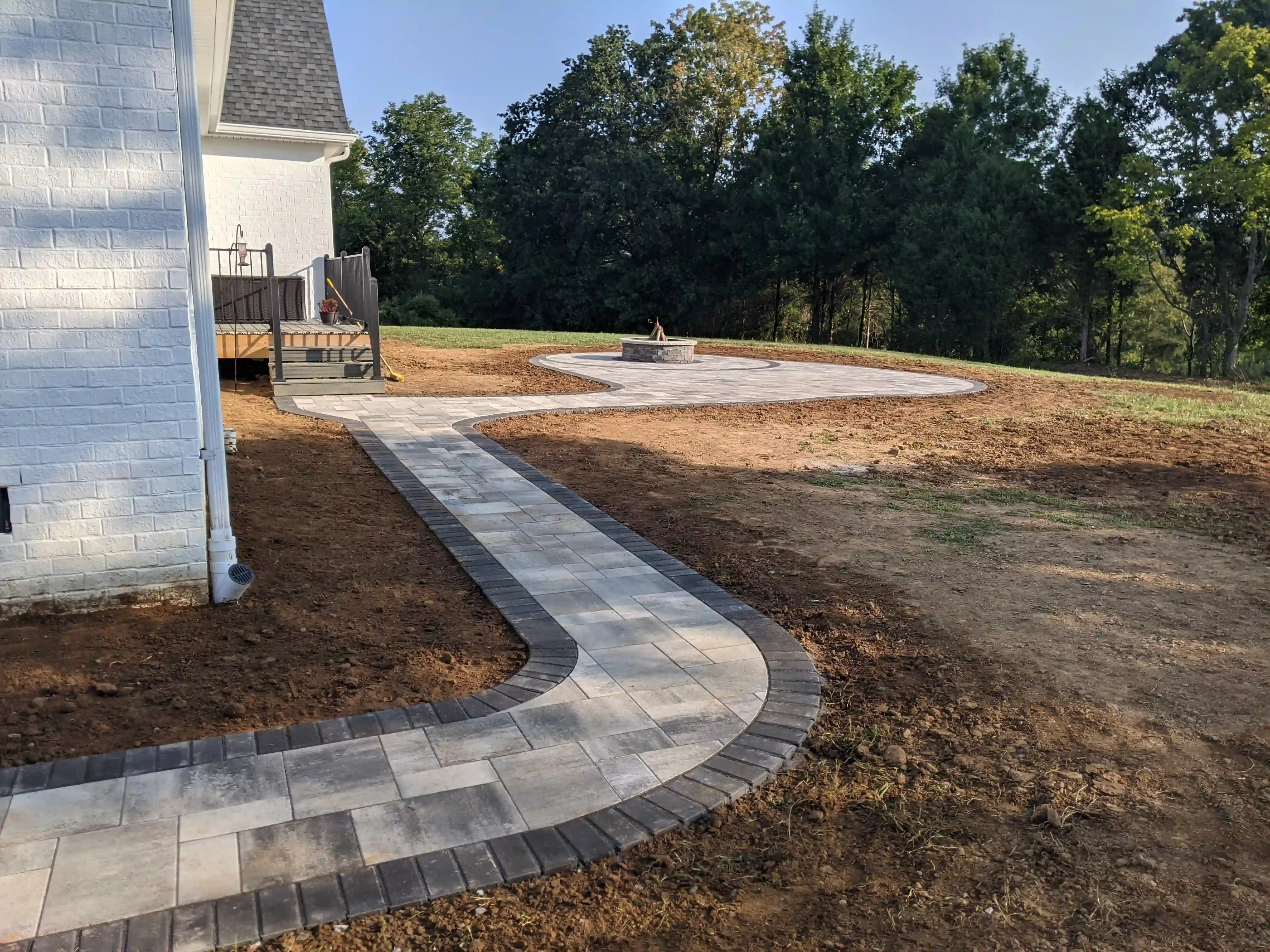 paver walway leading to paver patio