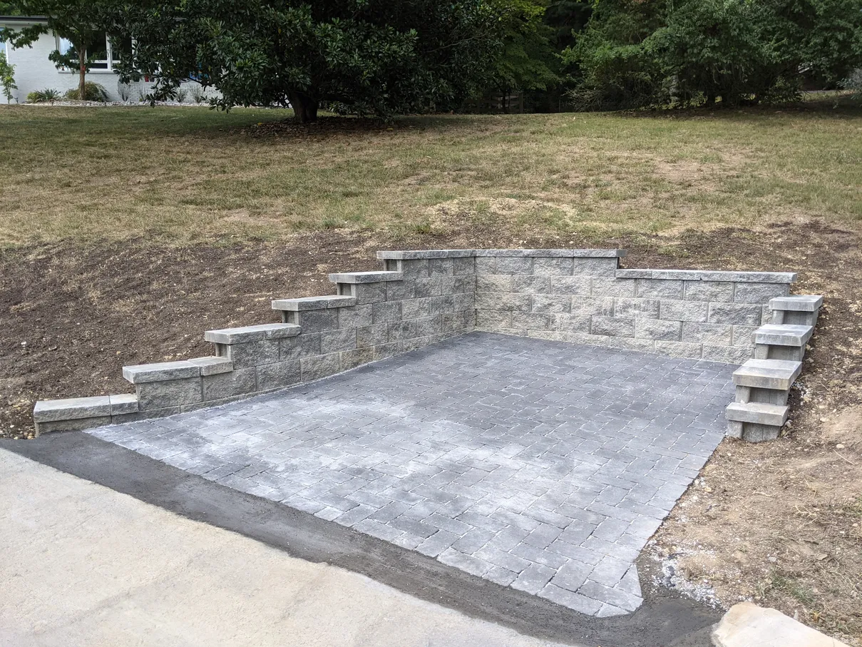 block retaining wall to create space for a parking spot